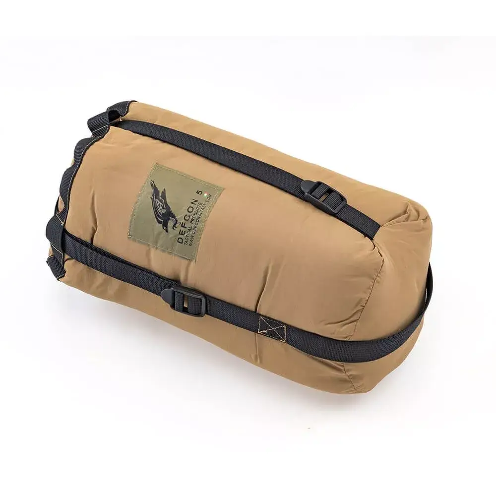 Veste réversible avec sac de compression